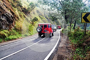 Colorful off-road cars in the Bromo mountains, East Java, Indonesia