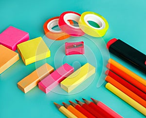 Colorful office stationary on pastel background