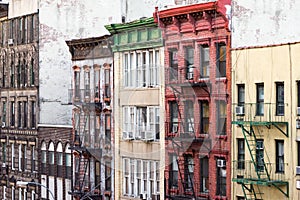 Colorful old buildings along a block in Chinatown New York City