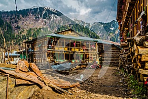 Colorful old buildings of ancient Indian village Malana in the state of Himachal Pradesh