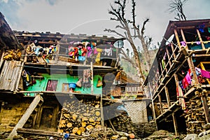 Colorful old buildings of ancient Indian village Malana in the state of Himachal Pradesh