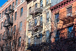 Colorful Old Buildings in Greenwich Village New York with Fire Escapes