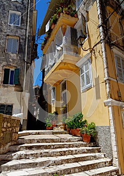 Colorful old house in narrow street in Kerkyra city, Corfu island, Greece