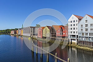 Colorful old storehouses along the river Nidelva in Trondheim