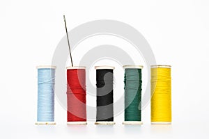 Colorful old style threads on white background