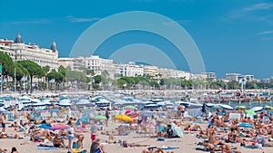Colorful old town and beach in Cannes timelapse on french Riviera in a beautiful summer day, France