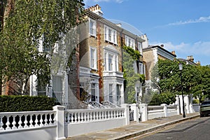 colorful old townhouses and apartment buildings in Chelsea district of London photo