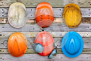 Colorful old and worn construction helmets