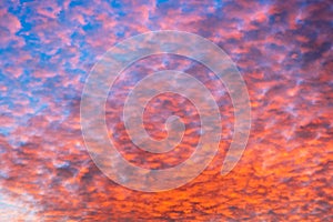 Colorful orange clouds on evening sky