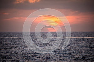 Colorful orange and purple sunset on the Pacific Ocean in La Jolla, San Diego California