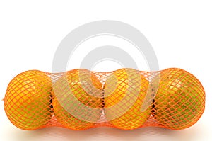 Colorful oranges in a red plastic net