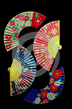 Colorful oriental printed paper fans background 