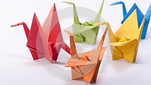 Colorful origami Crane bird dancing sequence in Circle. Tight-framing. Close up.