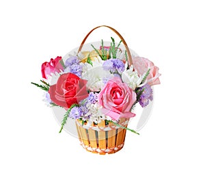 Colorful ornamental variety of flowers in the gift wood basket with roses , leaf and chrysanthemum natural patterns isolated on