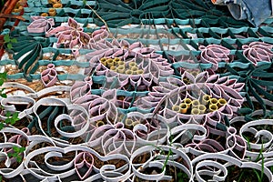 Colorful ornate gate lies on the ground