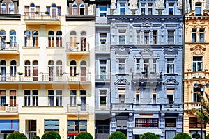 Colorful ornate historic building facade. Front view. Karlovy Vary, Czech Republic