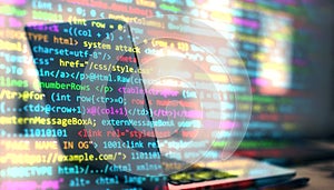 Colorful overlay of programming code on laptop screen, modern tech background