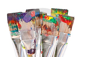Colorful paint on brushes