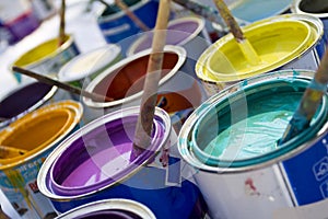Colorful paint and brushes