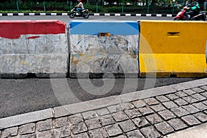 Colorful painted barriers for traffic contro photo