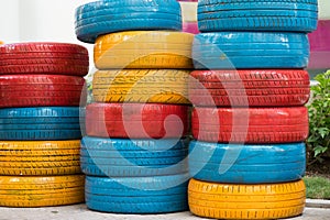 Colorful painted car tires. Used auto tire for decoration