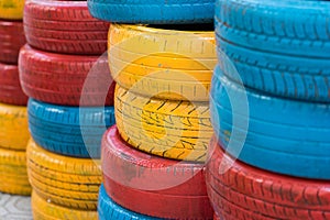 Colorful painted car tires. Used auto tire for decoration