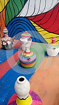 colorful painted clay kettles