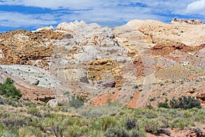 Colorful painted rocks with layered sediments in central Utah near Canyonland Zion Bryce and Goblin Valley photo