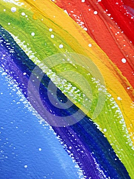 Colorful painting rainbow texture of red, yellow, green, blue stripes with white paint drops