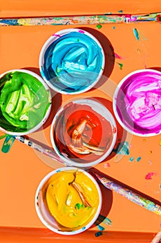 Colorful Paints Sit In Bowls For Kids To Paint With