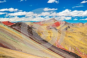 Colorful Palccoyo rainbow mountain Vinicunca alternative, mineral color stripes in Andean valley, Cusco, Peru, South America