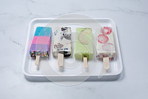 colorful paletas on tray