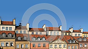 Colorful panorama of rooftops of old townhouses