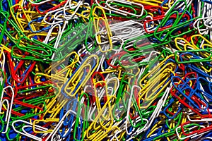 Colorful paper clips close up background