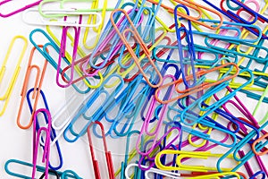 Colorful paper clips on the whit background