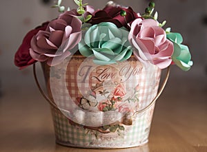 Colorful Paper Flowers in a small bucket