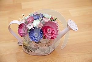 Colorful Paper Flowers in a small handshower