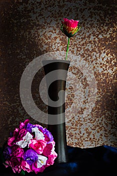 Colorful paper flowers in vase