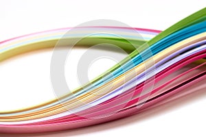 Colorful paper stripes on white background; abstract lines background