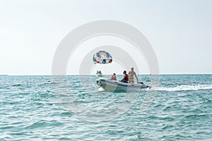 Colorful parasail wing pulled by a boat in the sea water - Alanya, Turkey