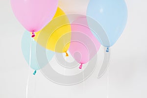 Colorful party balloons background. Isolated on white. Copy space