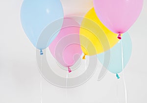 Colorful party balloons background. Isolated on white. Copy space