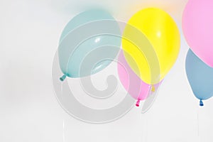 Colorful party balloons background. Isolated on white. Copy space