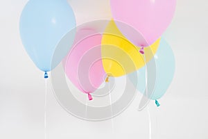 Colorful party balloons background. on white. Copy space