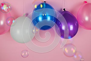Colorful party balloons with bubbles