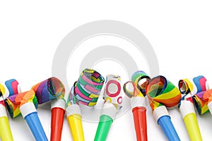 Colorful party blowers border photo