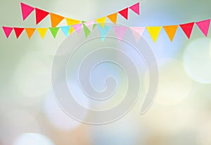 Colorful party flags hanging on blur abstract background, birthday, anniversary, celebrate event, festival greeting card