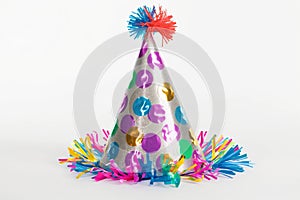 Colorful Party Hat and Blowers on White Background