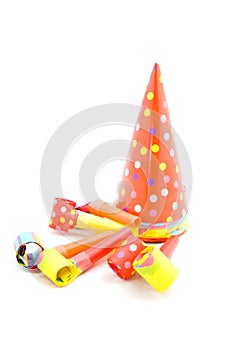 Colorful partyhats and party whistles