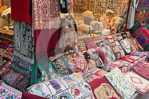Colorful pashmina shawls and handbags. Local art and craft photo